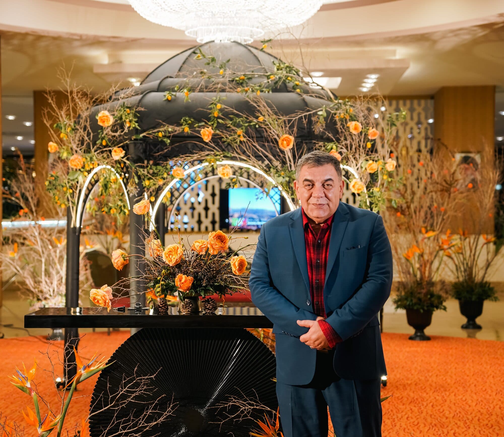 A guest standing at the recreated tomb of Hafez, photographed on arrival
